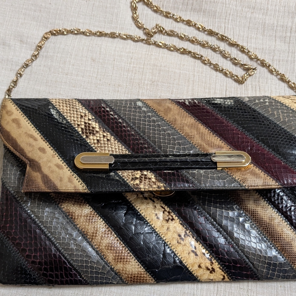 Supreme Diagonal Striped Snakeskin Clutch in Black, Brown, Gray, Gold, Burgundy